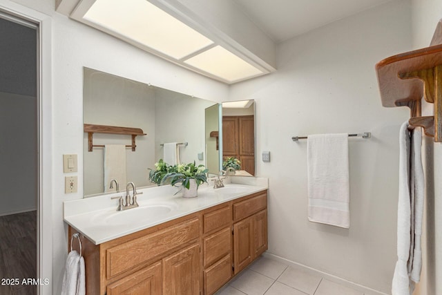 7839 E Milagro Ave, Mesa, AZ 85209 - bathroom featuring double vanity and tile patterned floors