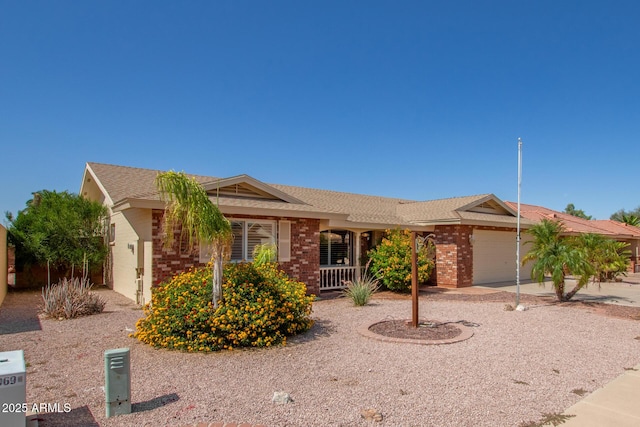 7839 E Milagro Ave, Mesa, AZ 85209 - single story home featuring an attached garage, brick siding, and a porch