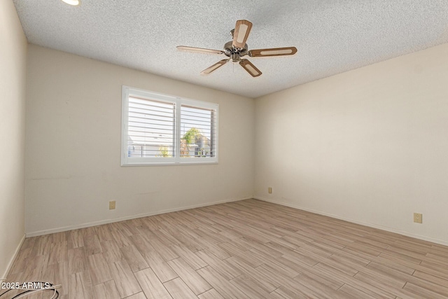 7839 E Milagro Ave, Mesa, AZ 85209 - spare room with light wood-type flooring, a textured ceiling, and a ceiling fan