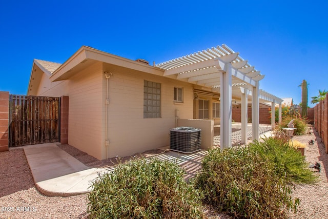 7839 E Milagro Ave, Mesa, AZ 85209 - view of side of property with a pergola, a fenced backyard, and a gate