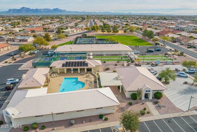 7839 E Milagro Ave, Mesa, AZ 85209 - aerial view of residential area with a pool and a mountain backdrop