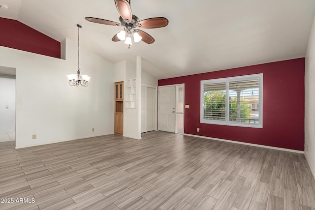 7839 E Milagro Ave, Mesa, AZ 85209 - unfurnished living room with a ceiling fan, vaulted ceiling, a chandelier, and light wood-style floors