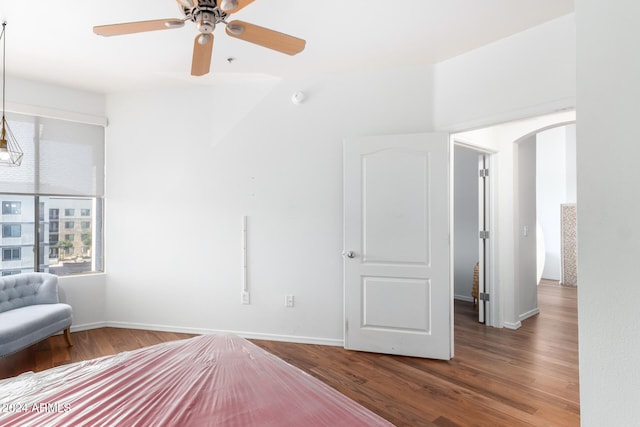 unfurnished bedroom with hardwood / wood-style floors and ceiling fan