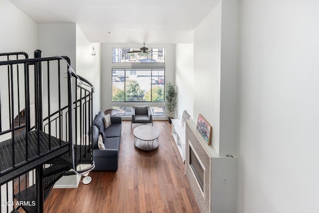 interior space with hardwood / wood-style floors and ceiling fan