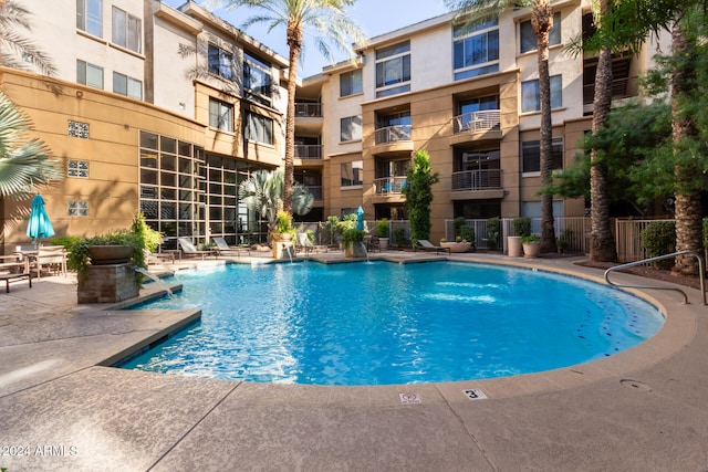 view of pool featuring a patio area