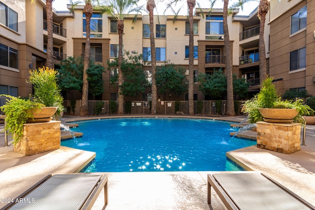 view of pool featuring pool water feature