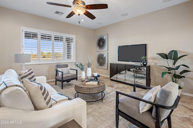 living room with ceiling fan