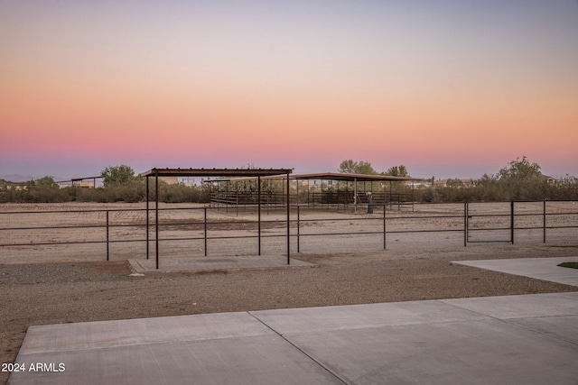 yard at dusk with an outdoor structure