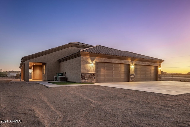 view of front of home with a garage