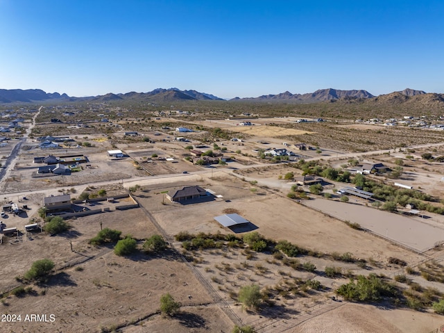 drone / aerial view featuring a mountain view