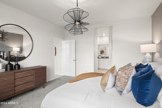 bedroom with light carpet, a chandelier, connected bathroom, and baseboards