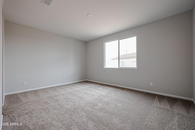 1917 S 246th Ln, Buckeye, AZ 85326 - spare room featuring baseboards, carpet flooring, and visible vents