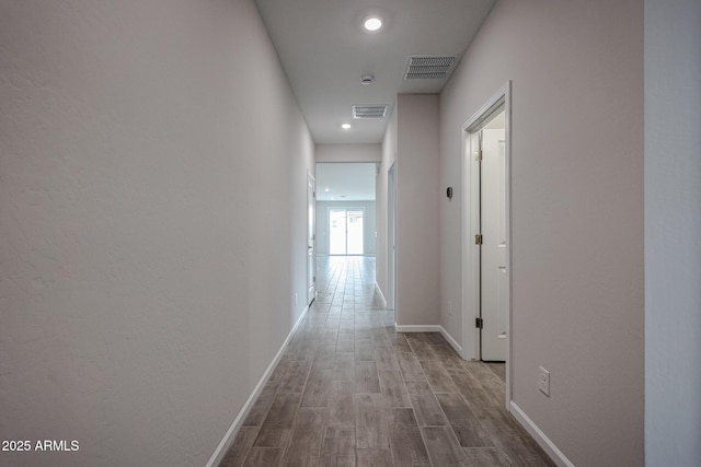1917 S 246th Ln, Buckeye, AZ 85326 - hall with recessed lighting, wood finished floors, visible vents, and baseboards