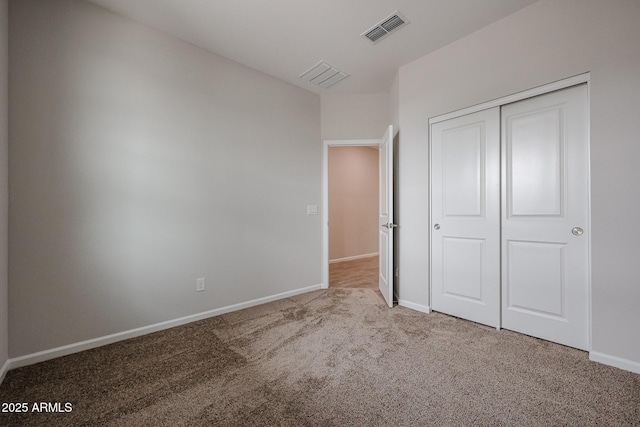 1917 S 246th Ln, Buckeye, AZ 85326 - unfurnished bedroom featuring baseboards, visible vents, a closet, and carpet flooring