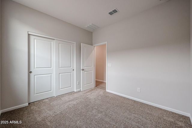 1917 S 246th Ln, Buckeye, AZ 85326 - unfurnished bedroom featuring baseboards, visible vents, carpet floors, and a closet