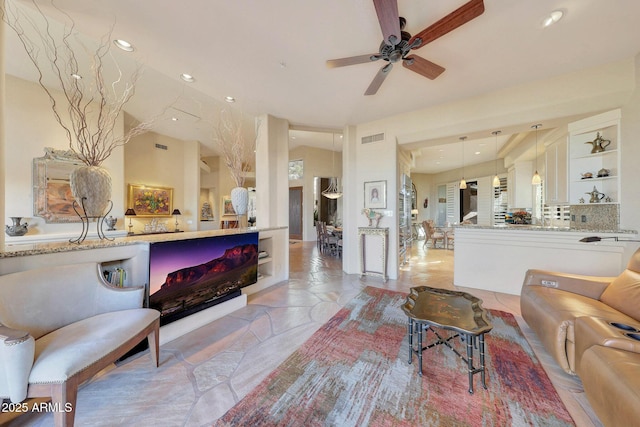 living room featuring ceiling fan