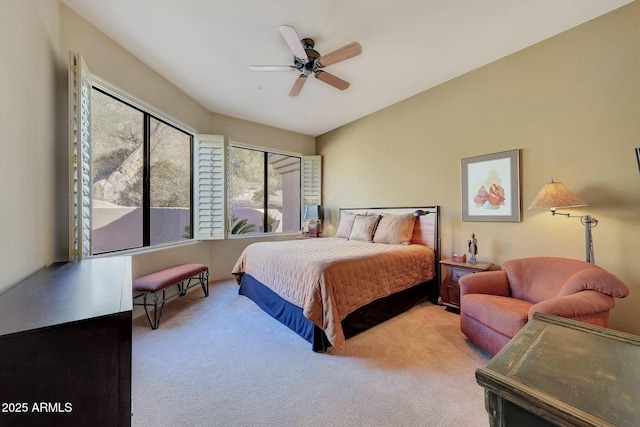 bedroom featuring ceiling fan and light carpet