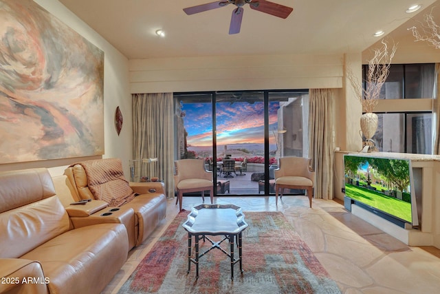 living room featuring ceiling fan