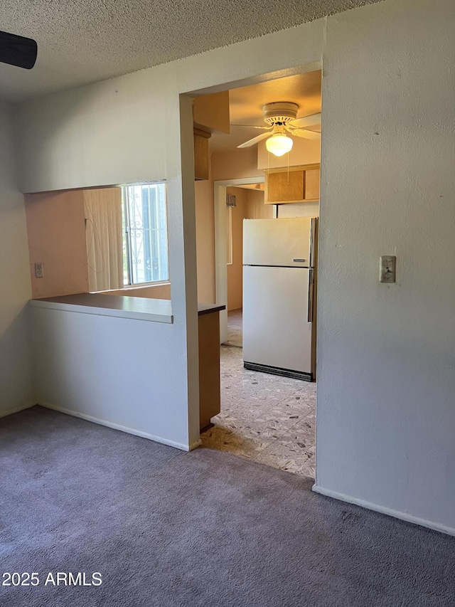 2530 W Berridge Ln Unit E111, Phoenix, AZ 85017 - unfurnished room featuring ceiling fan and carpet