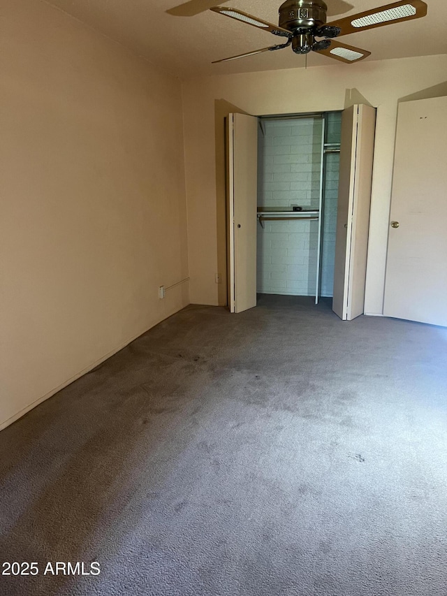 2530 W Berridge Ln Unit E111, Phoenix, AZ 85017 - unfurnished bedroom with carpet, a closet, and ceiling fan