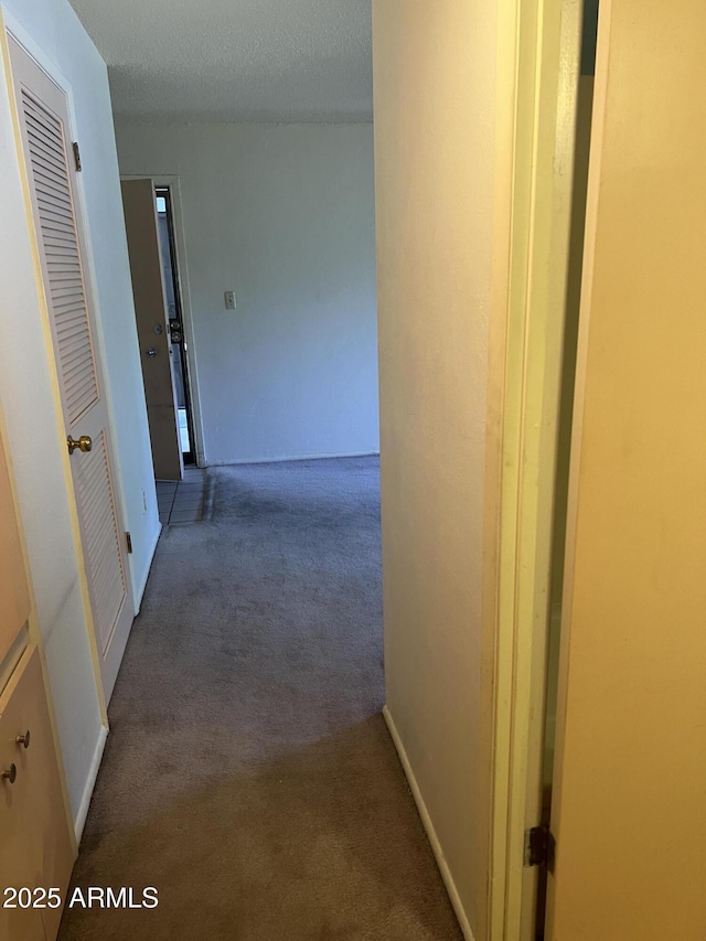 2530 W Berridge Ln Unit E111, Phoenix, AZ 85017 - hallway featuring carpet flooring