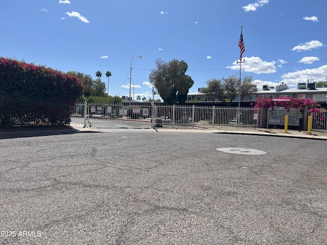 2530 W Berridge Ln Unit E111, Phoenix, AZ 85017 - view of vehicle parking with fence