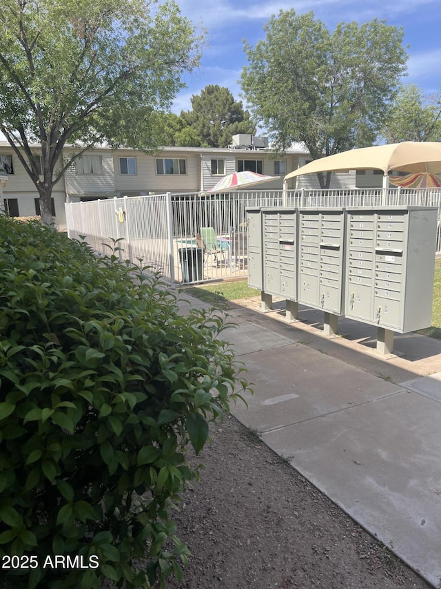 2530 W Berridge Ln Unit E111, Phoenix, AZ 85017 - view of home's community featuring mail area and fence