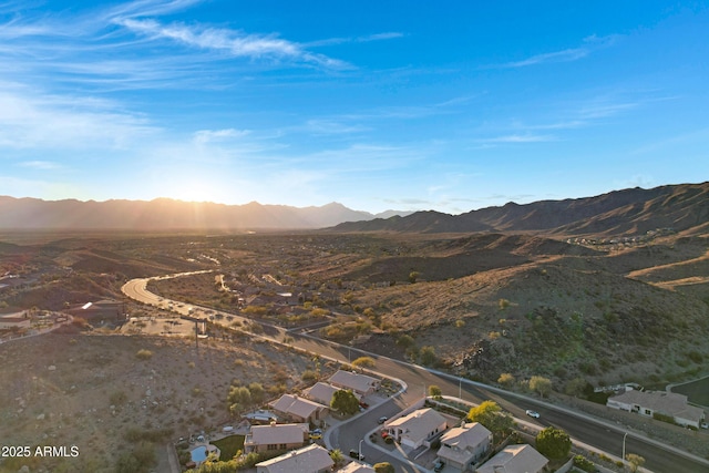 birds eye view of property featuring a mountain view