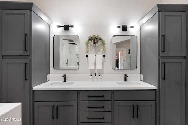 bathroom with a shower and vanity