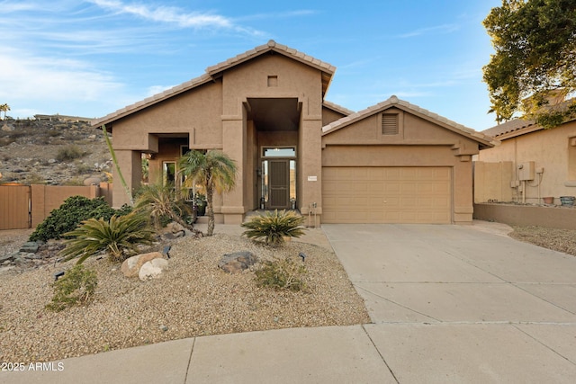 view of front of property with a garage