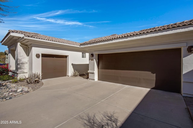 view of home's exterior with a garage