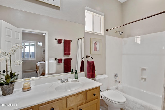 full bathroom featuring toilet, shower / tub combo, and vanity