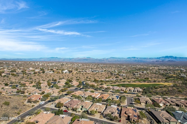 birds eye view of property featuring a mountain view