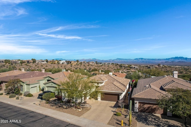 bird's eye view with a mountain view