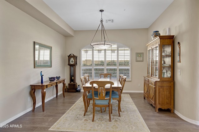 dining room featuring wood-type flooring