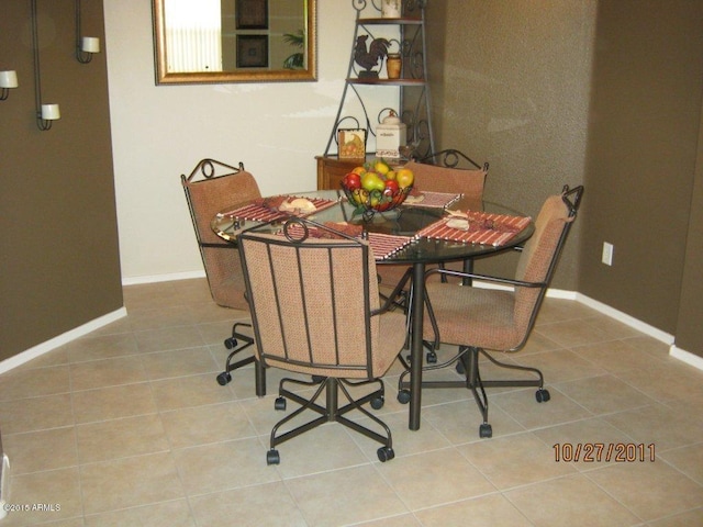3871 E Ironhorse Rd, Gilbert, AZ 85297 - dining space with tile patterned floors and baseboards