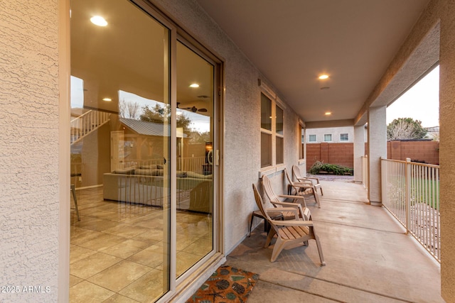 view of patio featuring fence