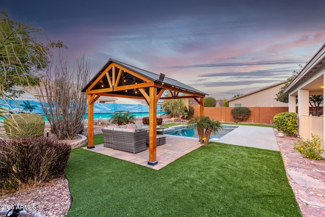 view of yard with a fenced in pool, a patio, a fenced backyard, an outdoor hangout area, and a gazebo