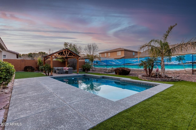 view of swimming pool with a fenced backyard, outdoor lounge area, a gazebo, a yard, and a patio area