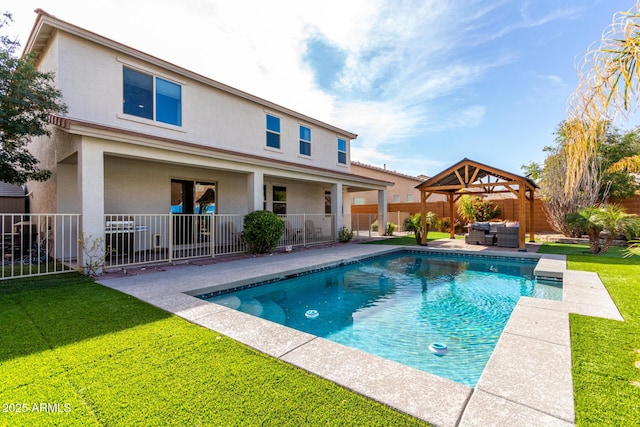 view of swimming pool featuring a patio area, a fenced backyard, a lawn, and a gazebo