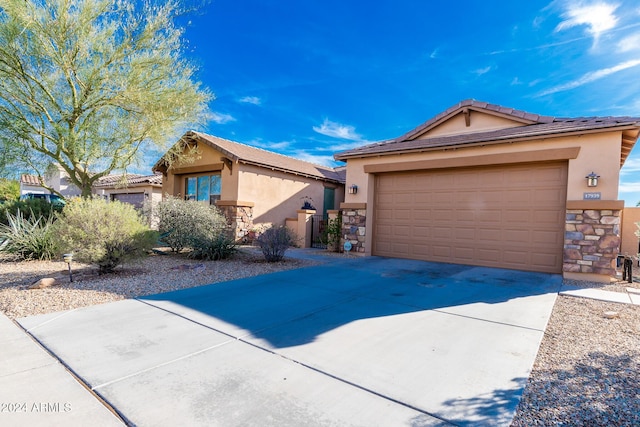 single story home with a garage