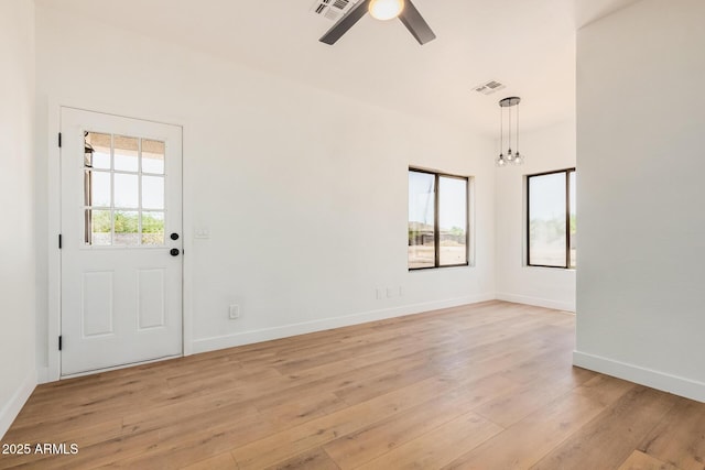 4561 E Red Bird Ln, San Tan Valley, AZ 85140 - spare room featuring a ceiling fan and light wood-style floors