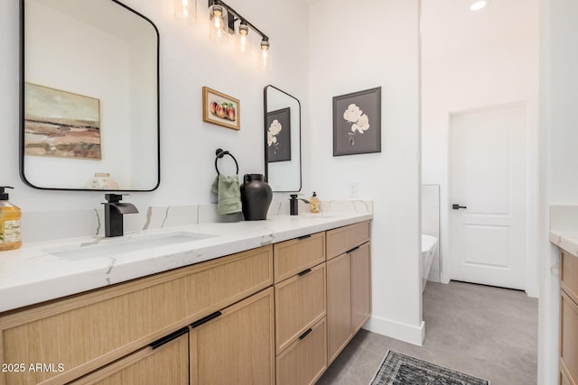 4561 E Red Bird Ln, San Tan Valley, AZ 85140 - bathroom featuring double vanity and a soaking tub