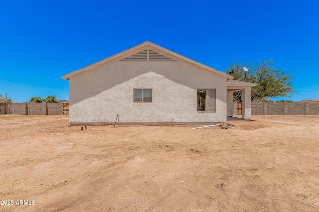 4561 E Red Bird Ln, San Tan Valley, AZ 85140 - back of property with stucco siding