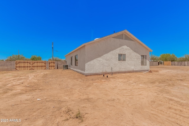 4561 E Red Bird Ln, San Tan Valley, AZ 85140 - rear view of property featuring stucco siding