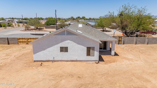 4561 E Red Bird Ln, San Tan Valley, AZ 85140 - back of house featuring stucco siding