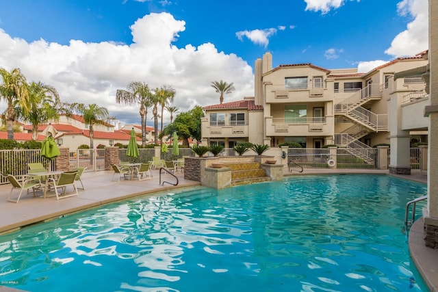 view of pool featuring a patio area