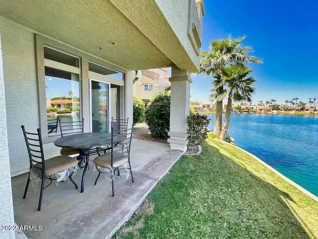 view of patio / terrace featuring a water view