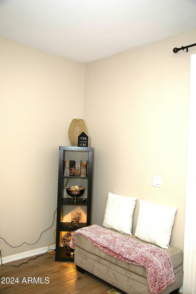 living area with wood-type flooring