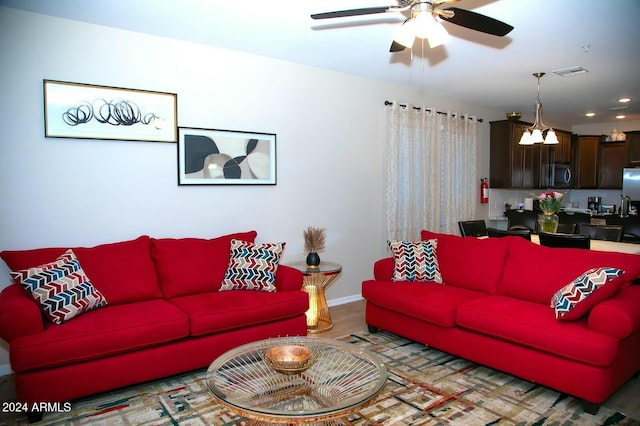 living room with ceiling fan